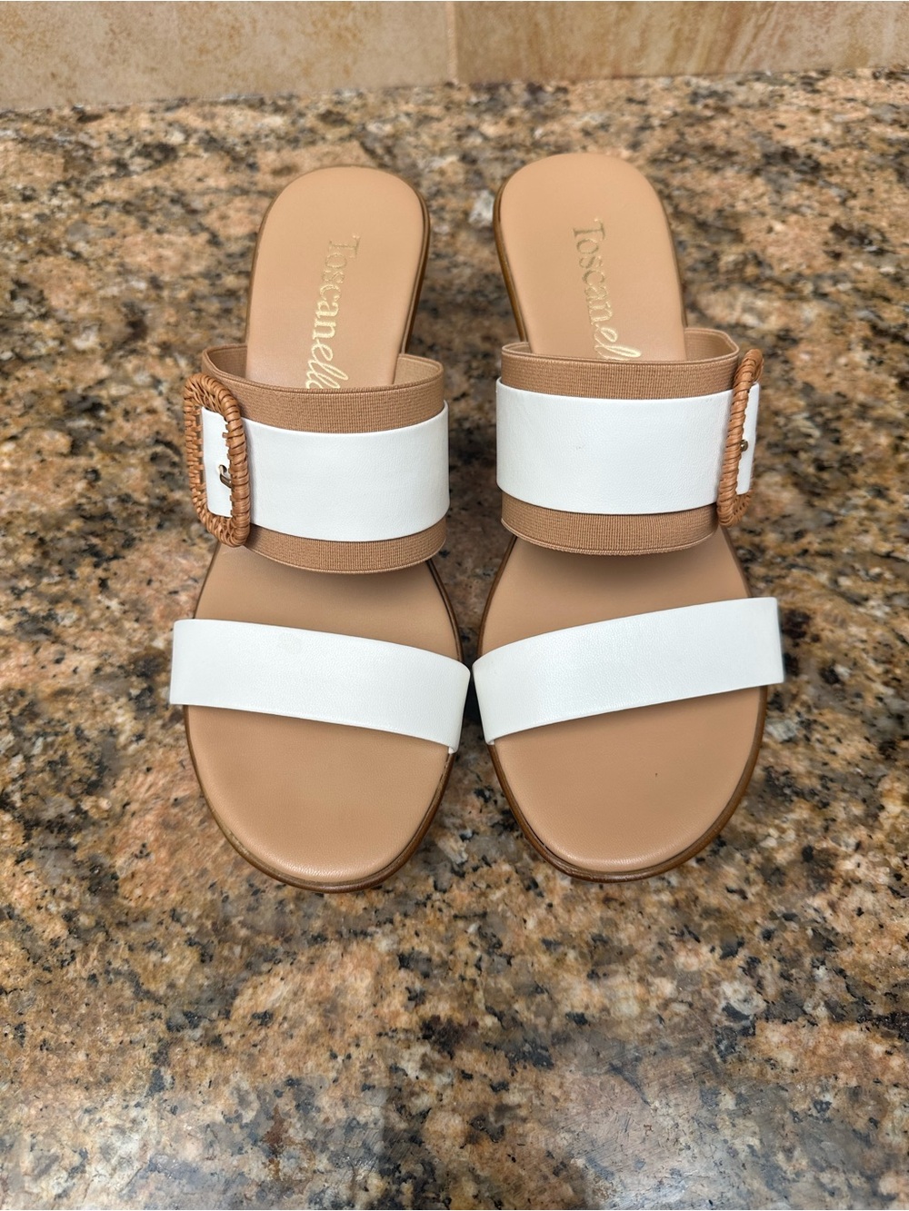 Women’s Toscanella white and tan wedge sandals. Size 8.5 excellent condition.